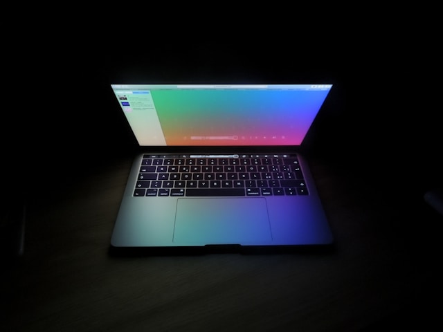 Open Laptop in a dark background