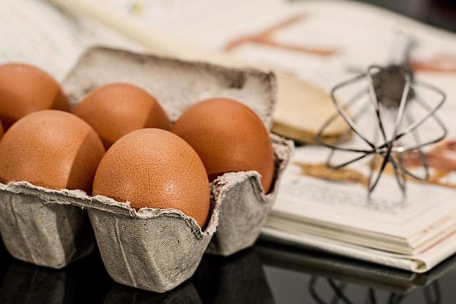 Image of eggs and a whisk